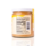 Nutrition label side of Sauce Bae Hot Raw Honey jar. The label displays the nutritional facts, indicating 60 calories per serving. The jar is set against a white background.