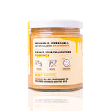 Sauce Bae crystallized raw honey jar, marketed as spoonable and perfect for charcuterie with cheese, meats, crackers.