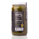 Sauce Bae Matcha Raw Honey on white backdrop with reflection showing nutrition panel. Unfiltered and unpasteurized raw honey. 60 calories, 17g of sugar.