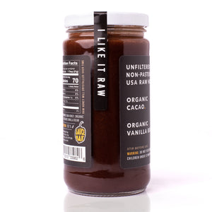 Sauce Bae Cacao Raw Honey with Vanilla Bean 1 lb Jar placed on a white backdrop, Back view of jar and label
