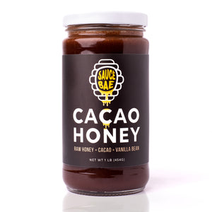 Sauce Bae Cacao Raw Honey 1 lb Jar placed on a white backdrop.