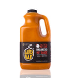 front view of Sauce Bae's Hotter Habanero 64 oz plastic hot sauce jug