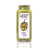 Sauce Bae LA Green Juice Hot Sauce bottle on white backdrop with reflection.