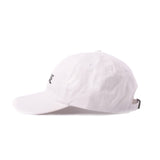 Side view of white dad hat with white embroidered 'Sauce Bae' logo on the front. Perfect for fans of Sauce Bae, a health-focused hot sauce and raw honey brand